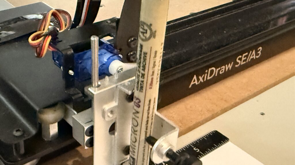 Blue servo on the pen lift mechanism of an AxiDraw SE/A3 pen plotter